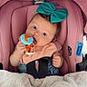 Ivy joined the competition — help win amazing prizes! baby, bow, car_seat, child, cute, blanket, toy, indoor, infant, pink, blue, face, person, sitting, clothing, headwear, soft, comfortable, closeup, portrait