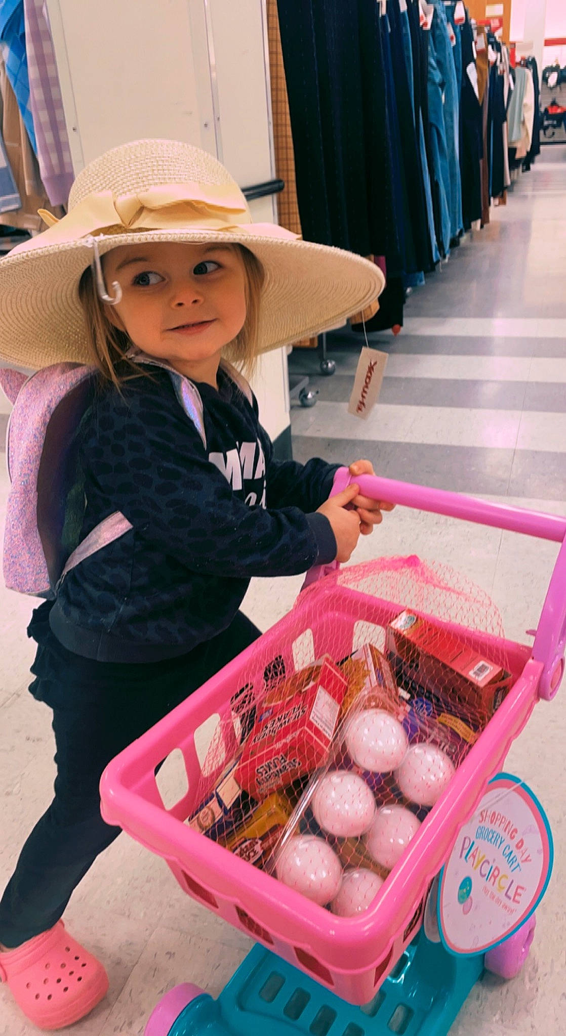 Hadleigh joined the competition — help win amazing prizes! basket, child, comfort_food, cowboy_hat, cuisine, easter, egg, event, fashion_accessory, food, hat, headwear, ingredient, local_food, market, natural_foods, person, pink, retail, sun_hat