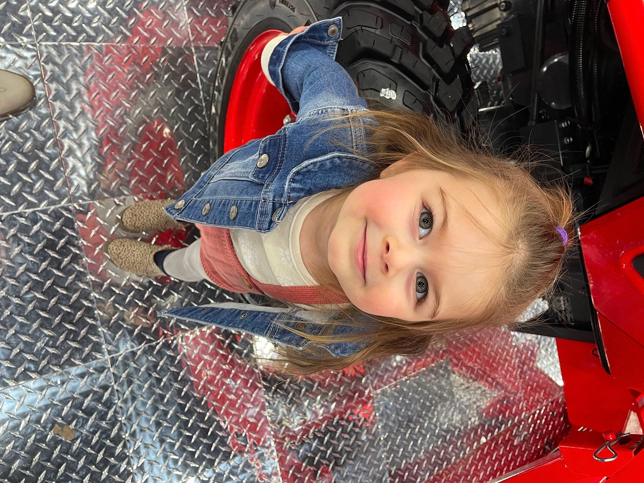 Hadleigh joined the competition — help win amazing prizes! chain_link_fencing, child, denim, electric_blue, eye, facial_expression, fence, flash_photography, fun, happy, joy, leisure, mesh, motor_vehicle, pattern, person, red, smile, toddler, tree