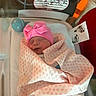 baby, bassinet, blanket, child, congratulations_label, cute, footprints, hat, hospital, indoors, infant, medical, newborn, peaceful, pink_bow, portrait, resting, sleeping, swaddled, wrapped