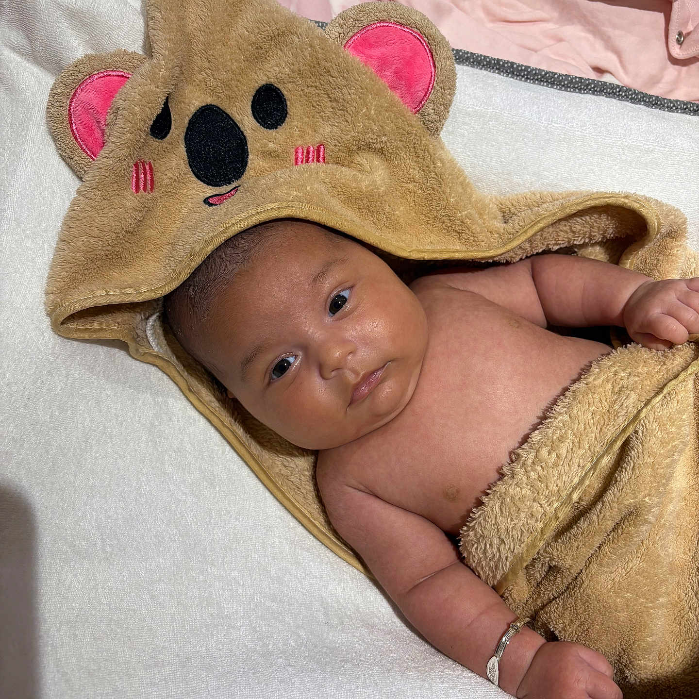 Pearl-Rose joined the competition — help win amazing prizes! arm, baby, blanket, bracelet, child, cute, expression, face, hand, hooded_towel, indoors, infant, koala, lying_down, newborn, portrait, skin, sleepwear, soft_texture, towel