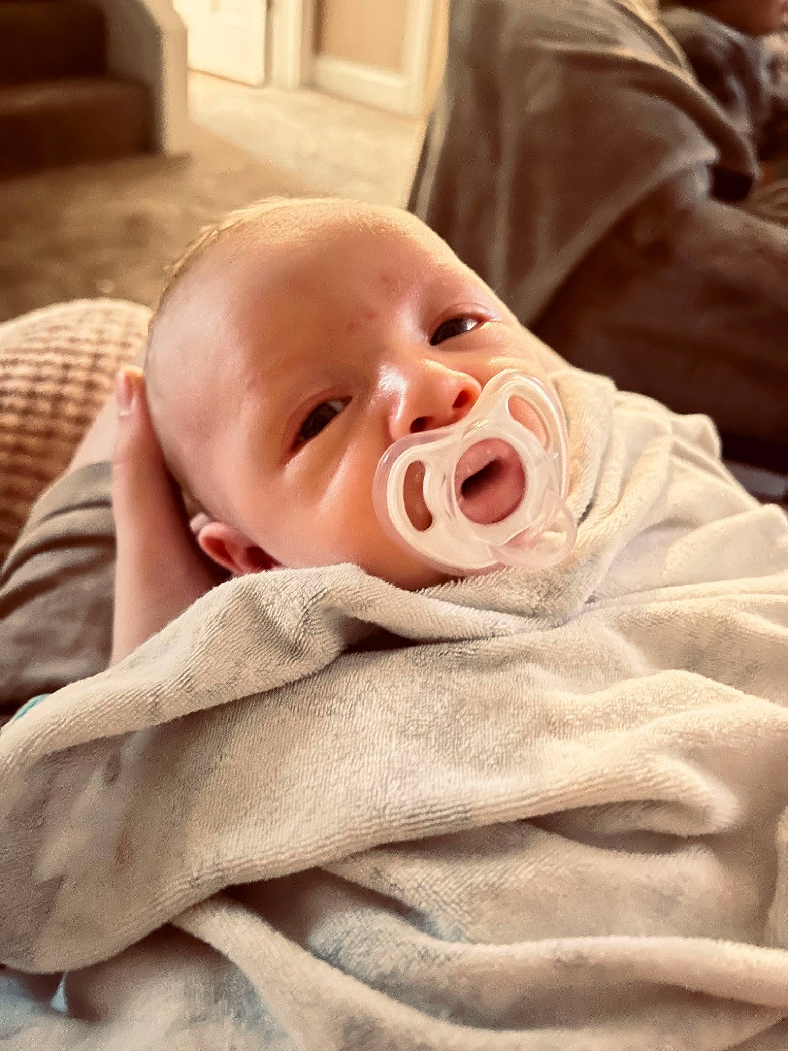 Payton is registered to the contest to win money with this photo: baby, baby_toddler_clothing, carmine, cheek, child, chin, comfort, eyelash, facial_expression, happy, linens, mouth, people, person, product, room, sitting, skin, sleeve, thumb