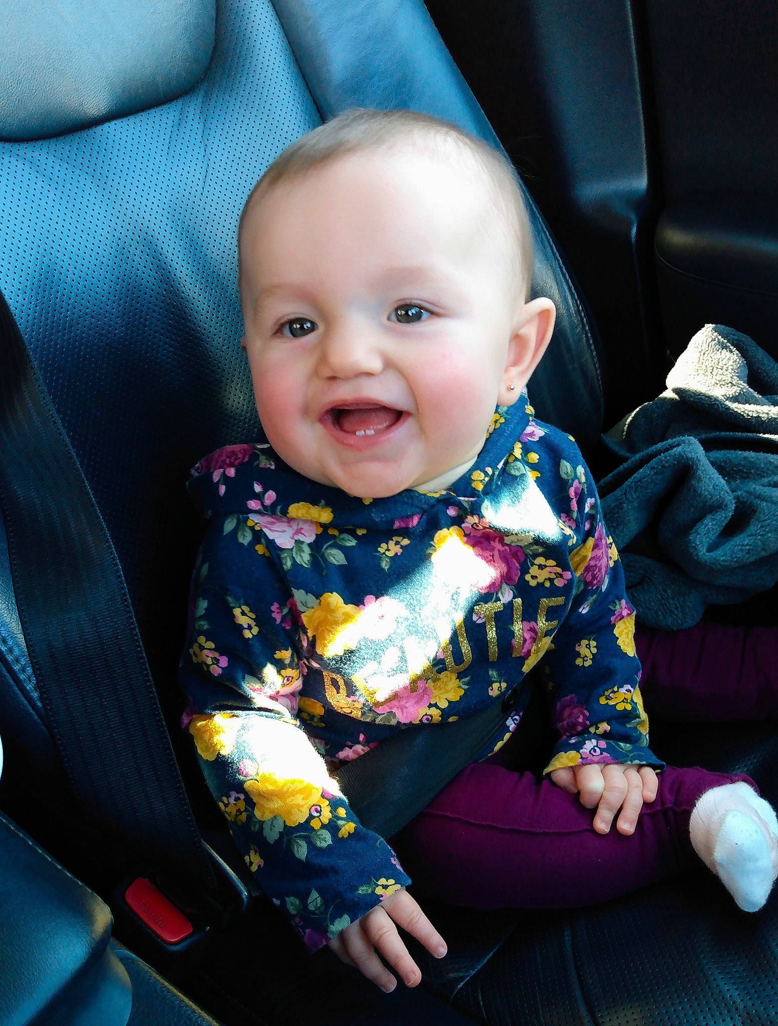 Carleigh is registered to the contest to win money with this photo: baby, baby_in_car_seat, baby_products, baby_toddler_clothing, car_seat, cheek, child, comfort, iris, lap, laugh, mouth, nose, person, product, sitting, toddler