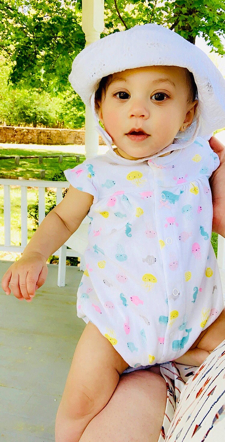 Vivien joined the competition — help win amazing prizes! baby, baby_toddler_clothing, beauty, child, child_model, clothing, design, fashion_accessory, hat, headgear, headwear, pattern, person, pink, play, product, skin, sleeve, sun_hat, toddler