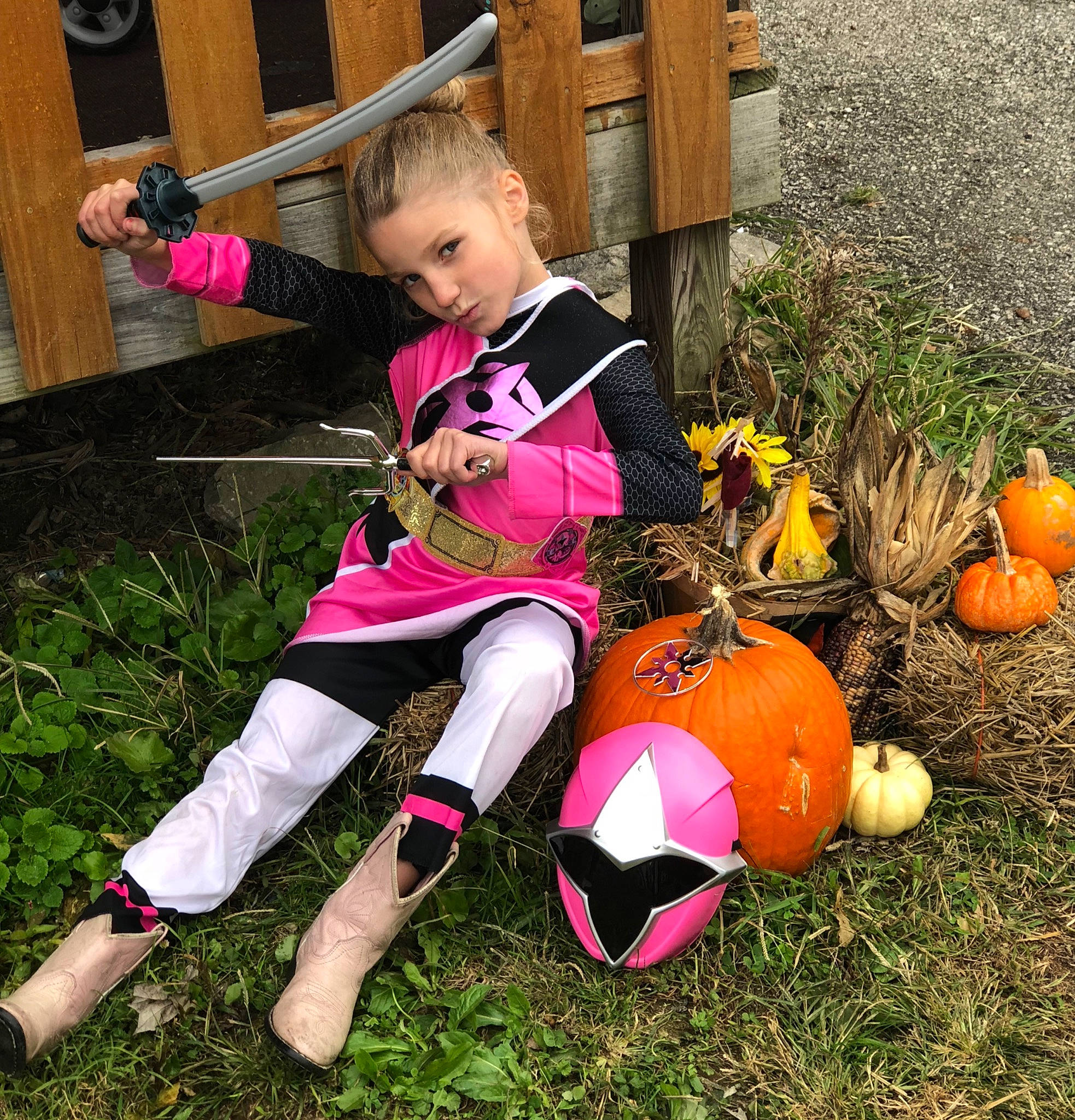 Coralyne is registered to the contest to win money with this photo: child, costume, grass, leg, person, plant, play, pumpkin, toddler, trick_or_treat