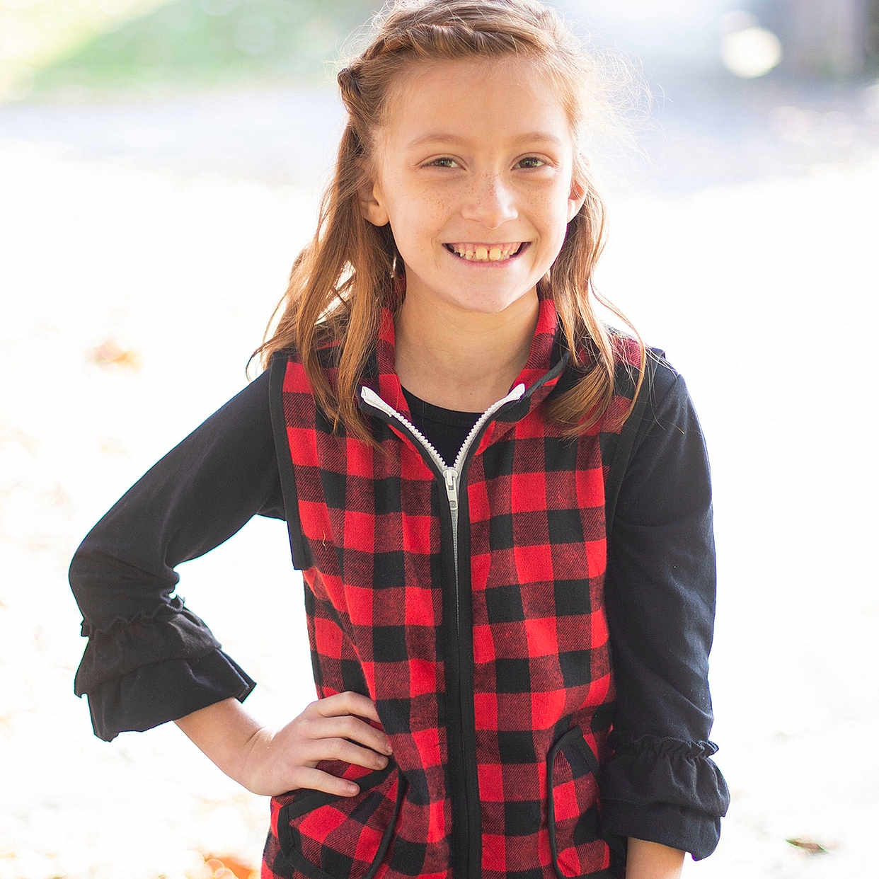 Kayanna is registered to the contest to win money with this photo: child, child_model, clothing, design, face, fashion, jacket, joy, outerwear, pattern, people, person, photograph, photography, plaid, red, sleeve, smile, street_fashion, tartan