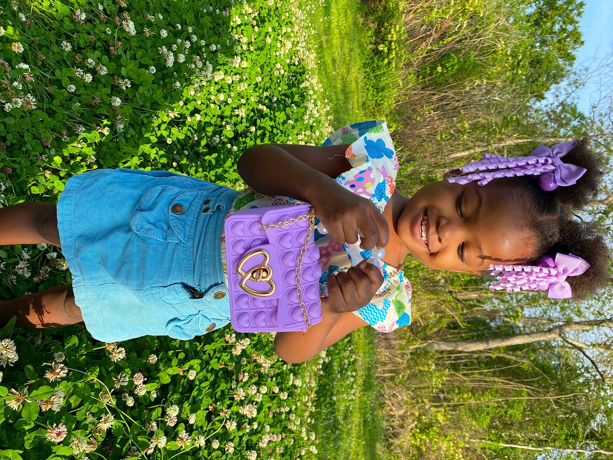 Avery joined the competition — help win amazing prizes! botany, electric_blue, flower, fun, grass, grass_family, groundcover, happy, hat, joy, leisure, meadow, people_in_nature, person, pink, plant, shrub, summer, t_shirt, thigh