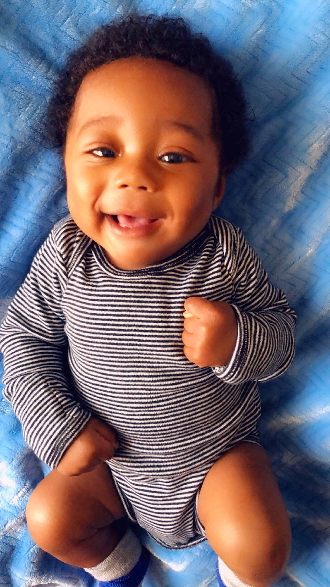 Demari joined the competition — help win amazing prizes! baby, black_hair, blue, cheek, child, child_model, face, facial_expression, happy, head, human, lip, nose, person, portrait, portrait_photography, sitting, skin, smile, toddler