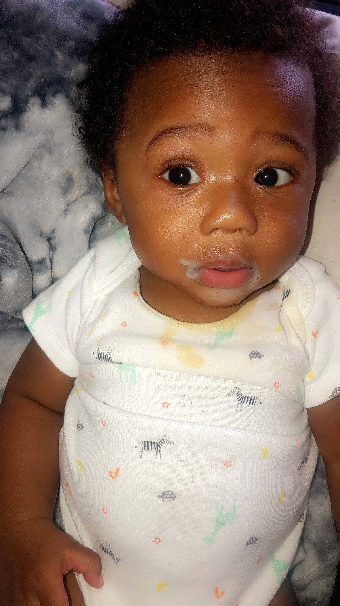 Demari is registered to the contest to win money with this photo: baby, black_hair, cheek, child, chin, eye, eyebrow, face, forehead, head, lip, mouth, neck, nose, person, skin, smile, toddler