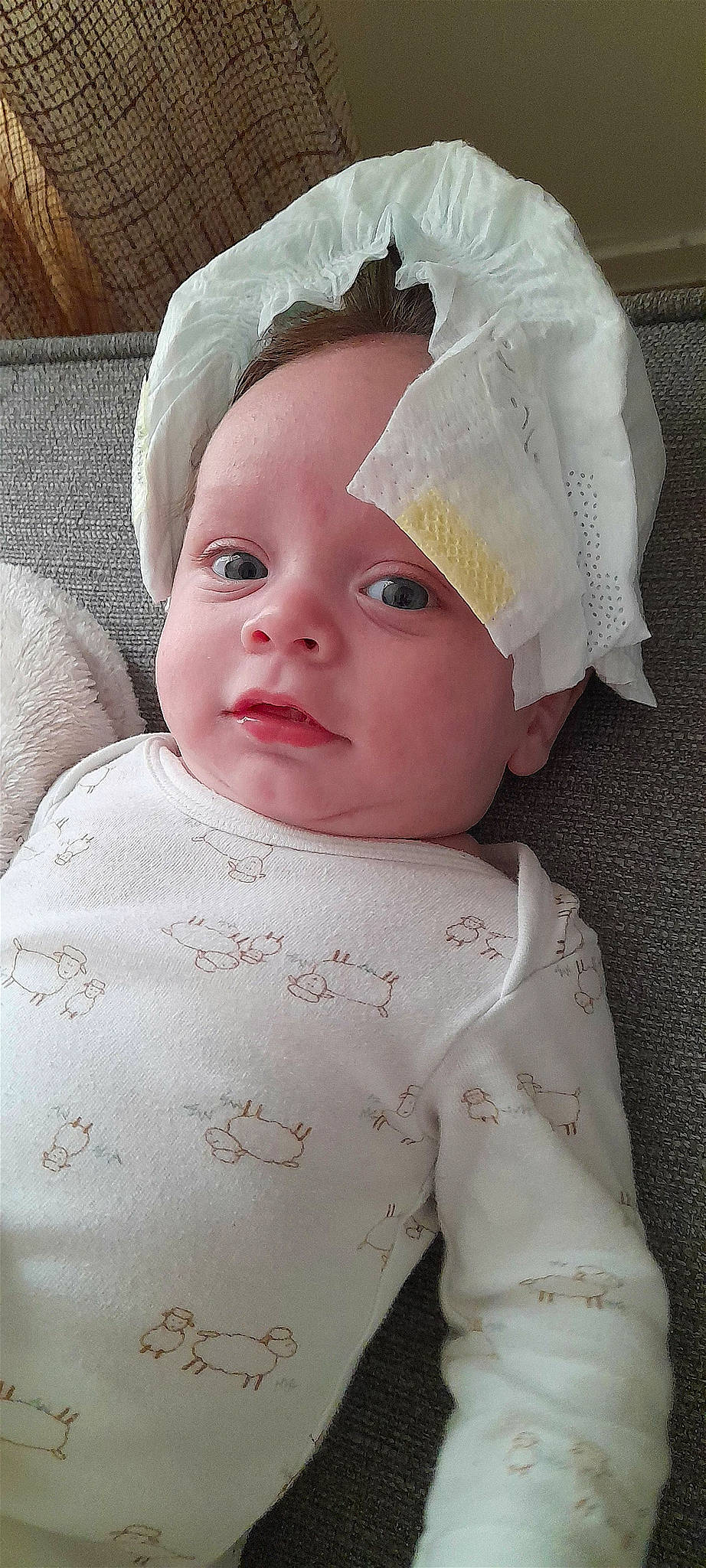 Dorian participe au concours pour gagner de l'argent avec cette photo : baby, baby_toddler_clothing, cap, cheek, child, chin, comfort, costume_hat, eyebrow, eyelash, face, headgear, iris, lip, outerwear, person, pink, skin, sleeve, textile