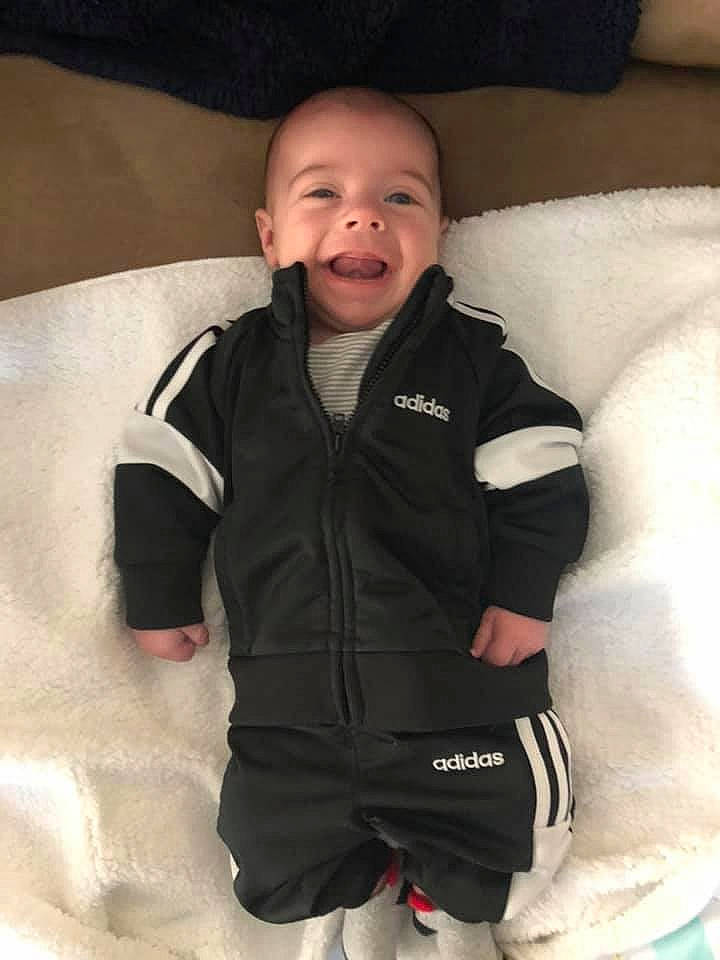 Erik joined the competition — help win amazing prizes! baby, baby_carriage, baby_products, cheek, child, facial_expression, jacket, outerwear, person, product, skin, sleeve, smile, toddler