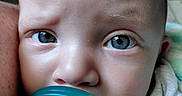 Amara joined the competition — help win amazing prizes! baby, blanket, blue_eyes, child, close_up, comfort, cute, expression, face, hair, indoors, infant, mouth, pacifier, person, portrait, skin, soft, toddler, young