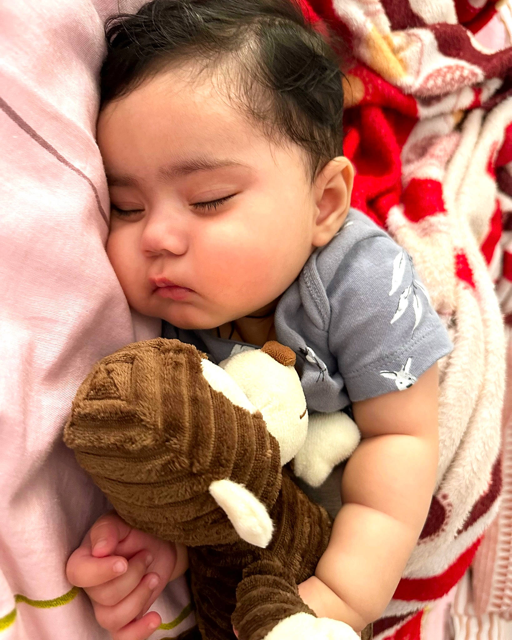 Amber is registered to the contest to win money with this photo: baby, baby_toddler_clothing, cheek, comfort, eyelash, face, facial_expression, finger, gesture, hand, happy, head, interaction, mouth, nose, person, skin, sleeve, textile, thumb