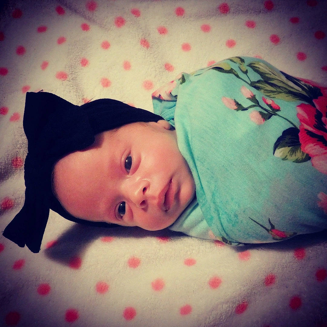 Ashlynn is registered to the contest to win money with this photo: baby, baby_sleeping, baby_toddler_clothing, child, cloud, comfort, eye, face, grass, happy, head, linens, lip, nose, pattern, person, skin, sleeve, textile, tints_and_shades