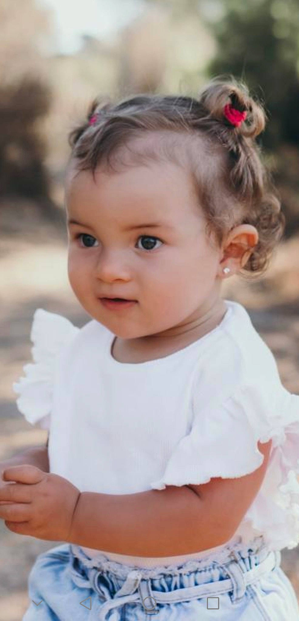 Jenna participe au concours pour gagner de l'argent avec cette photo : baby_toddler_clothing, cheek, child, dress, eyelash, face, flash_photography, grass, hair, hairstyle, happy, head, human_body, iris, lip, person, plant, skin, sleeve, smile