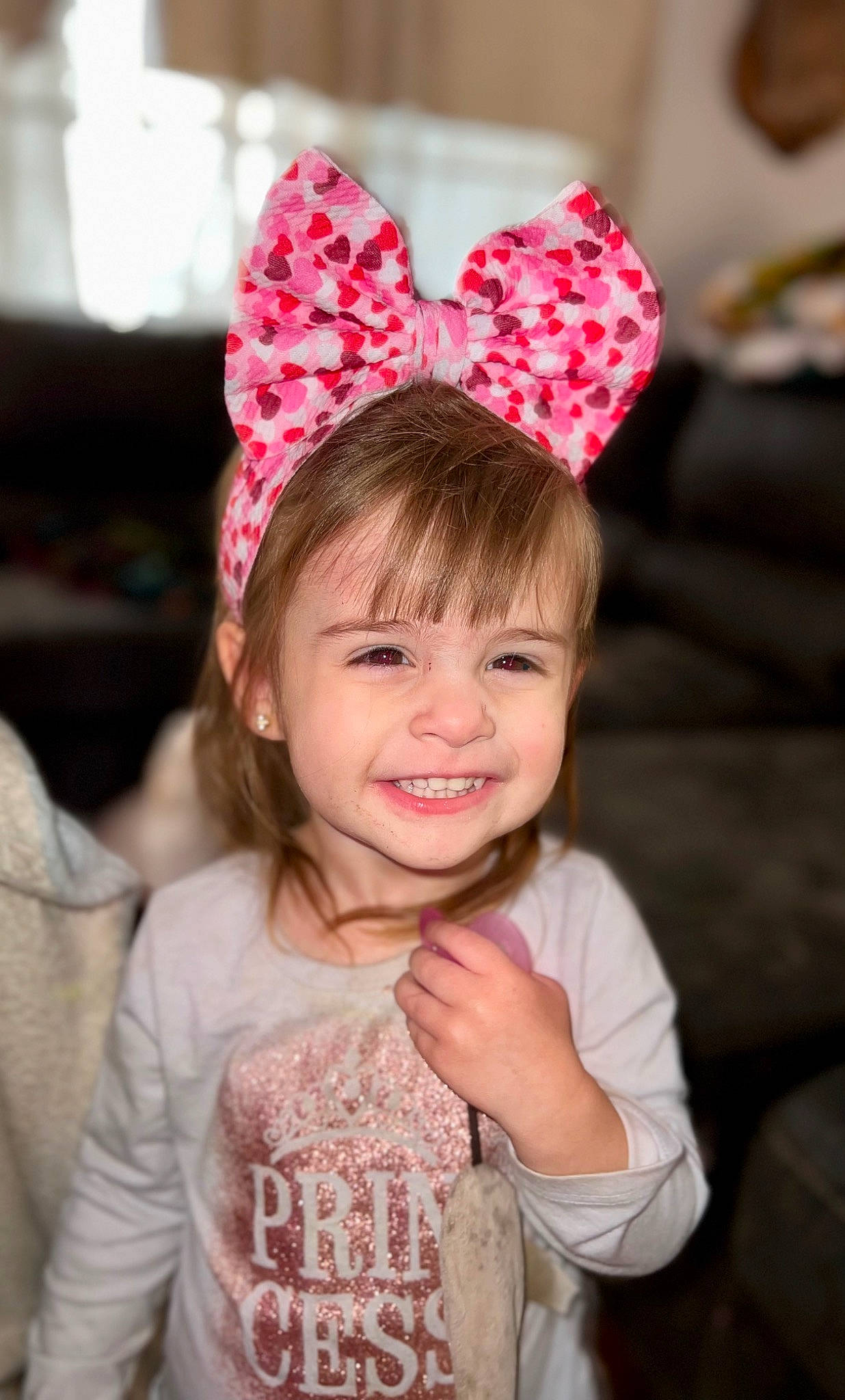 Blakeleigh is registered to the contest to win money with this photo: birthday, cap, child, costume_hat, event, eye, facial_expression, fun, happy, headgear, headpiece, helmet, joy, lip, magenta, party_hat, party_supply, people, person, pink