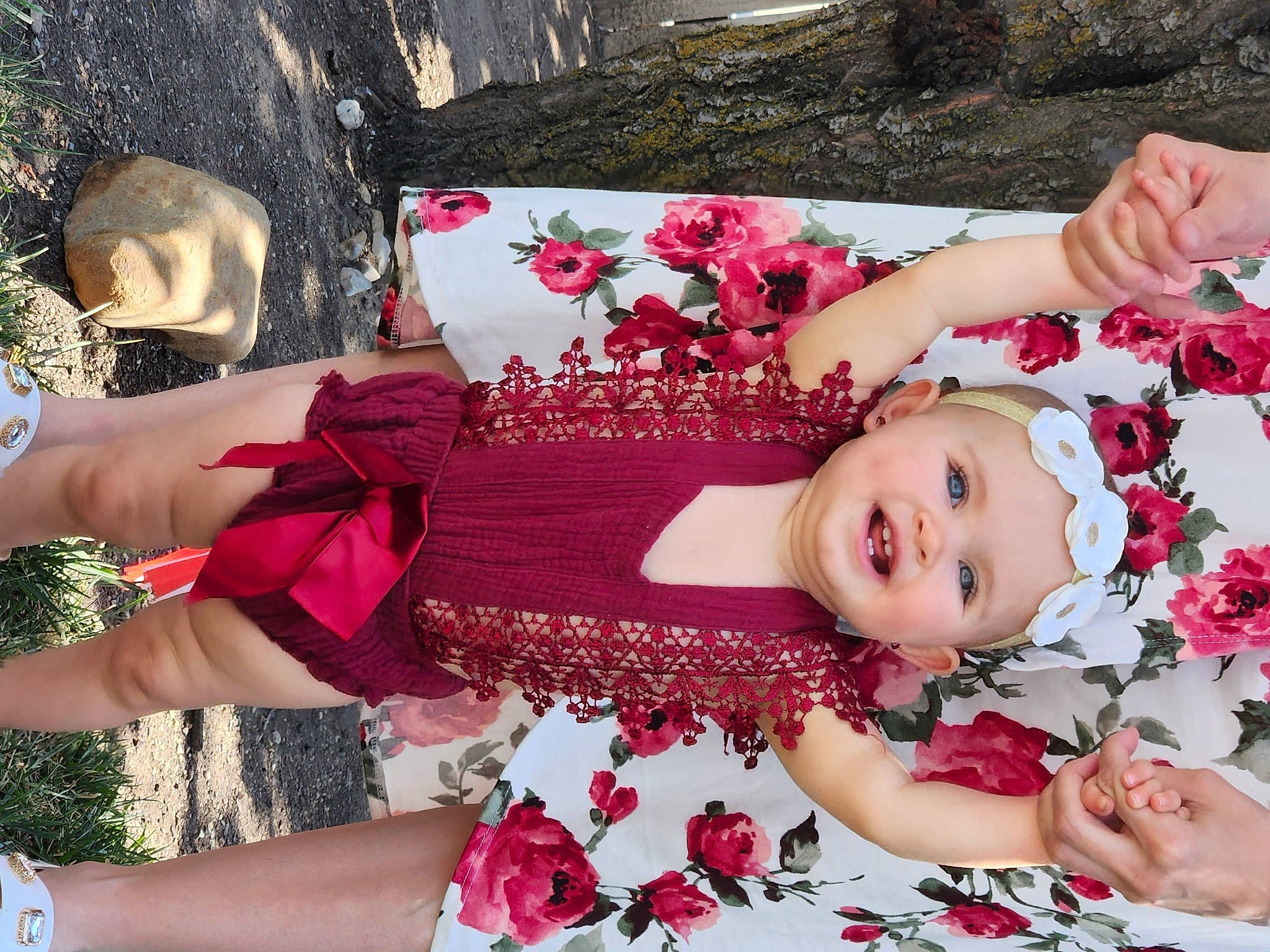 Londynn is registered to the contest to win money with this photo: botany, child, event, floral_design, flower, flower_arranging, happy, headwear, joy, magenta, pattern, person, petal, pink, plant, product, red, rose, smile, textile