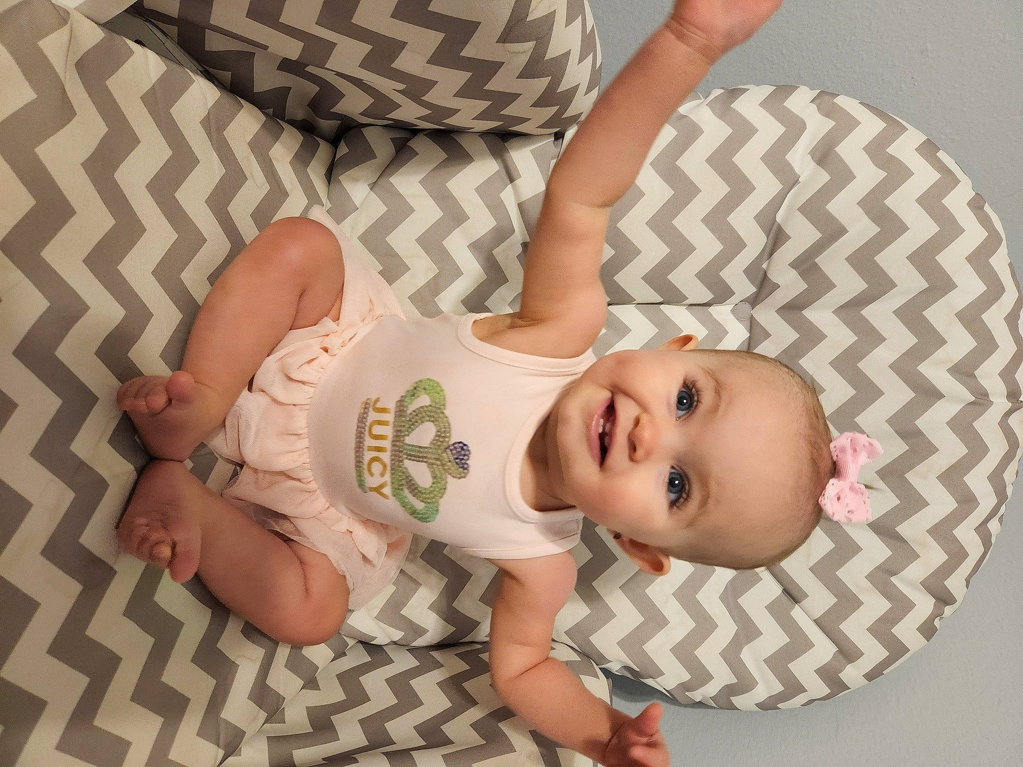 Londynn joined the competition — help win amazing prizes! baby, baby_products, baby_toddler_clothing, cheek, child, comfort, finger, flooring, fun, gesture, happy, headgear, human_body, joy, pattern, person, sleeve, smile, stomach, toddler
