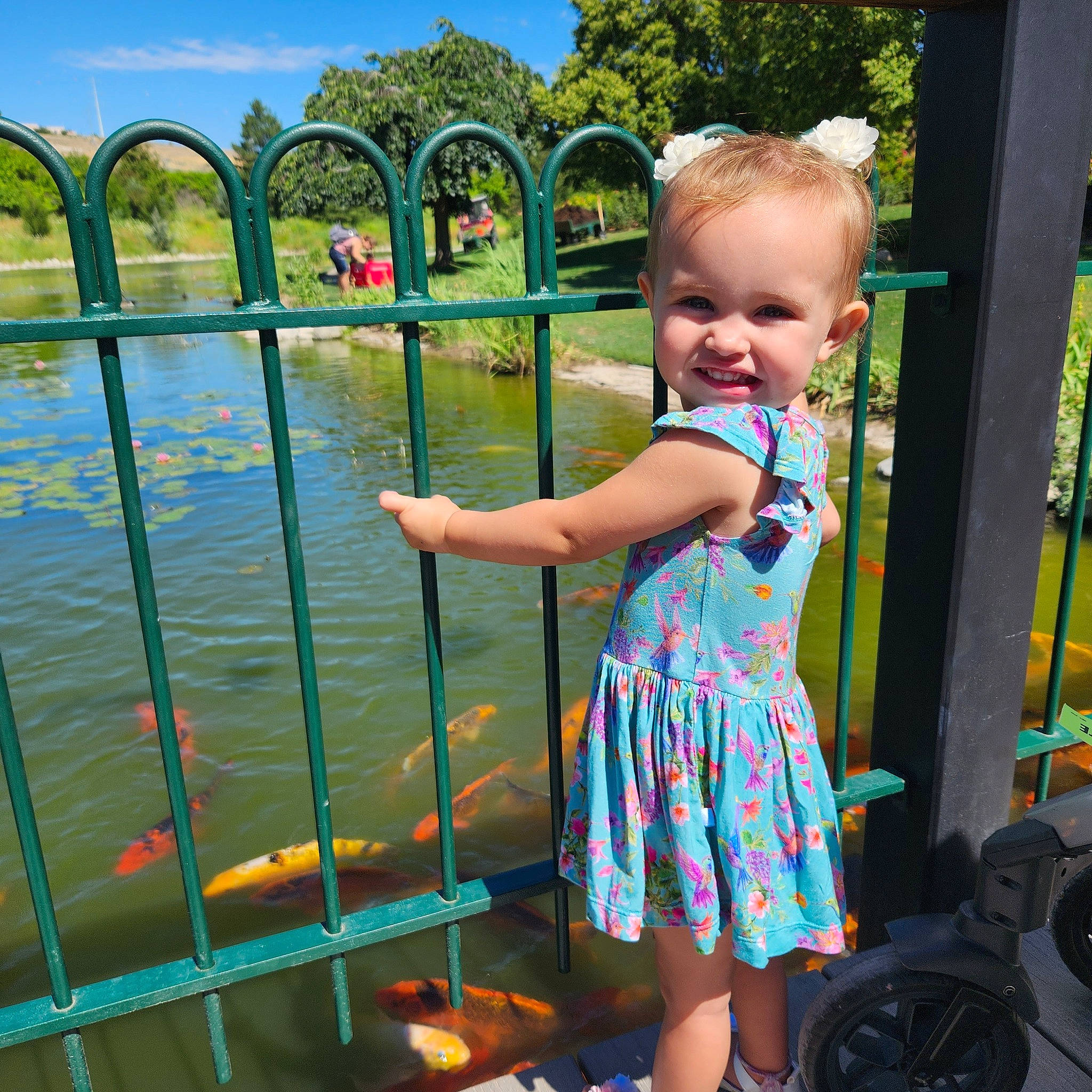 Londynn joined the competition — help win amazing prizes! baby, baby_toddler_clothing, child, city, fun, grass, happy, joy, lake, leisure, magenta, person, play, recreation, reservoir, sky, smile, summer, toddler, travel