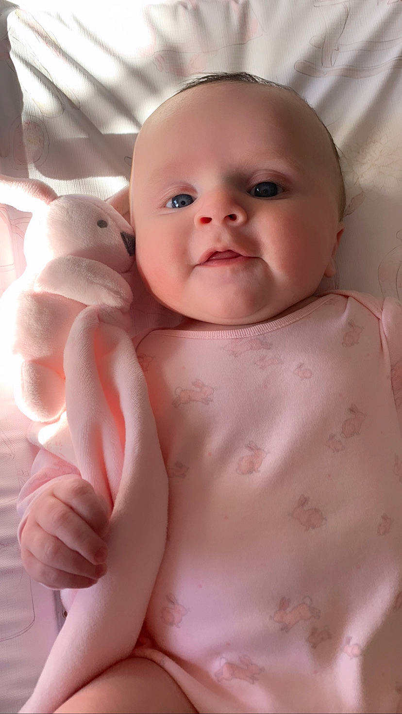 Esmé joined the competition — help win amazing prizes! abdomen, baby, baby_toddler_clothing, cheek, chest, chin, eyelash, finger, gesture, human_body, iris, lip, mouth, neck, person, pink, skin, stomach, thumb, toddler