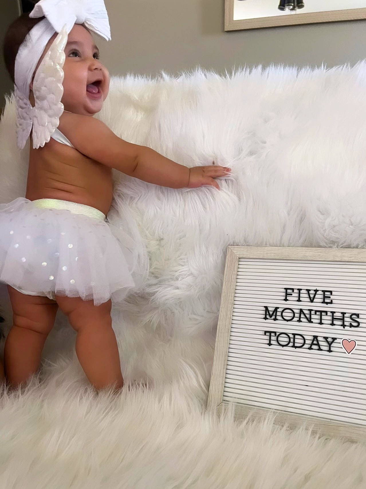 Alaia joined the competition — help win amazing prizes! baby, baby_toddler_clothing, bridal_accessory, child, costume, embellishment, event, fashion_accessory, fashion_design, flash_photography, fun, fur, happy, hat, headpiece, headwear, human_leg, person, ruffle, smile