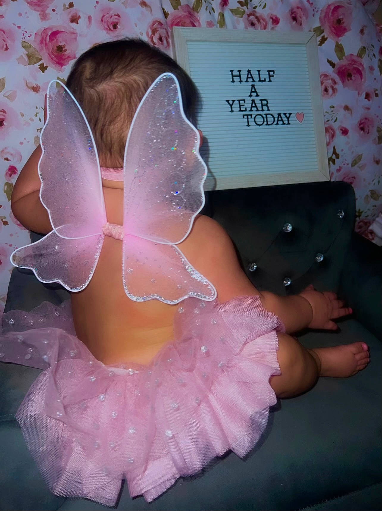 Alaia is registered to the contest to win money with this photo: art, baby_toddler_clothing, bridal_accessory, child, costume, embellishment, fashion_accessory, finger, hair_accessory, headgear, headpiece, jewellery, lace, magenta, pattern, peach, person, petal, pink, ruffle