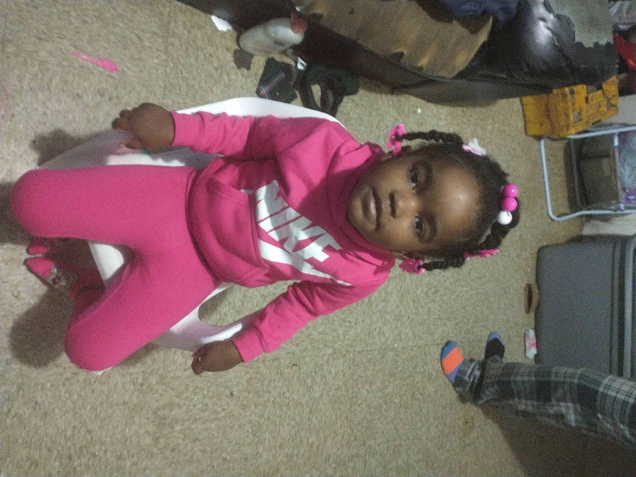 Alaina joined the competition — help win amazing prizes! carmine, child, fun, leisure, luggage_and_bags, magenta, person, pink, plant, smile, sneakers, tire, toddler, tree