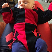 Isabella is registered to the contest to win money with this photo: arm, child, clothing, costume, human_positions, person, red