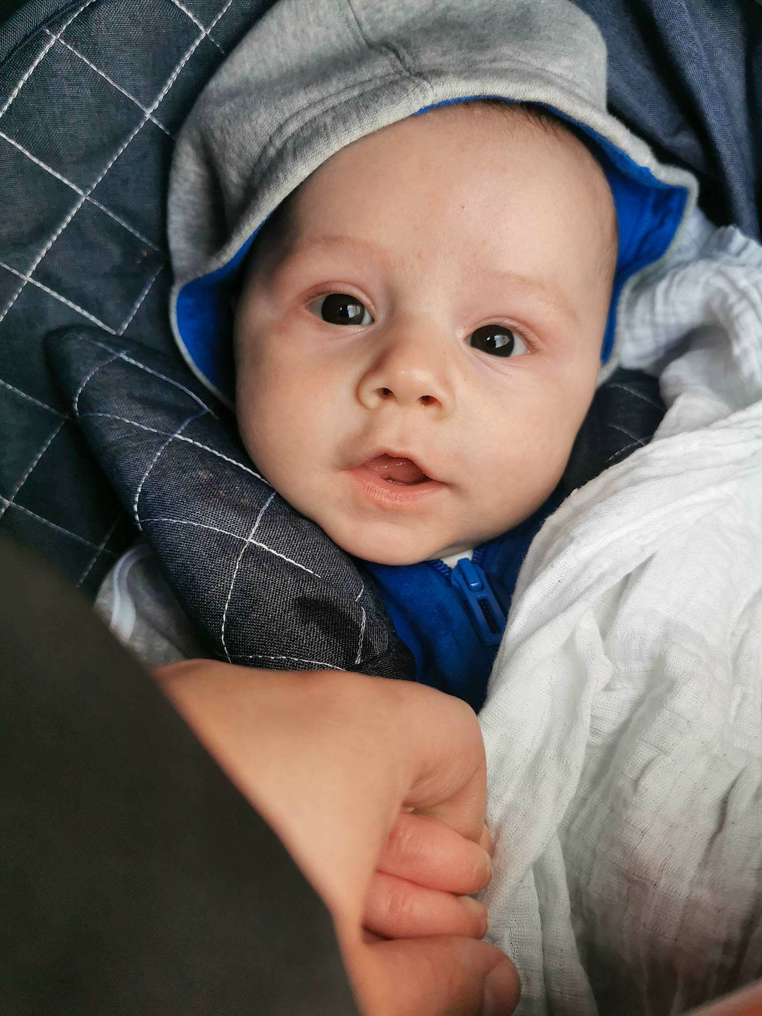Henry joined the competition — help win amazing prizes! baby, baby_products, baby_toddler_clothing, cap, cheek, child, comfort, electric_blue, fashion_accessory, happy, linens, pattern, person, portrait_photography, skin, sleeve, thumb, toddler