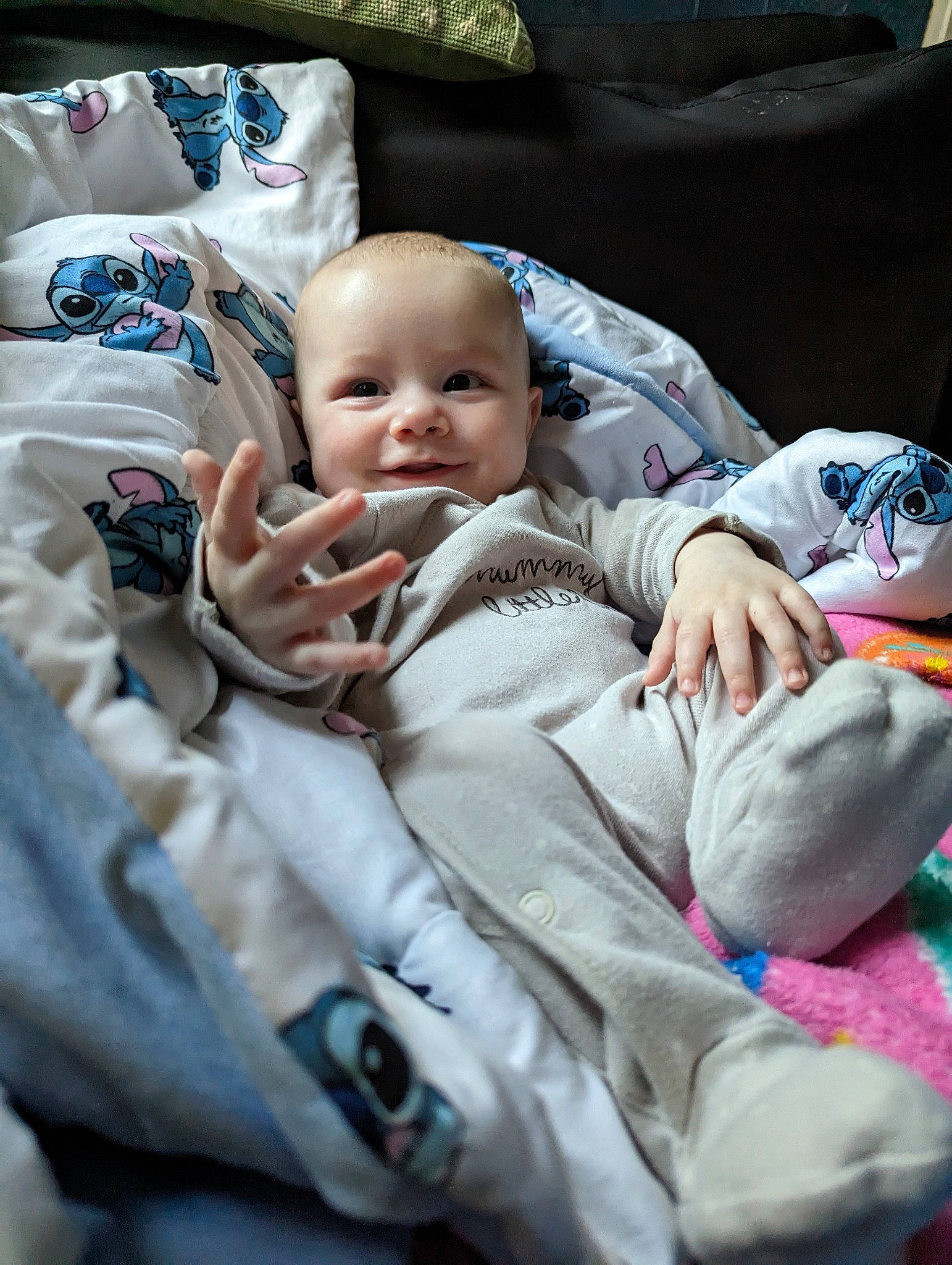 Henry joined the competition — help win amazing prizes! baby, baby_carriage, baby_products, baby_safety, baby_toddler_clothing, cheek, child, comfort, couch, fun, gesture, happy, lap, linens, person, room, sitting, smile, toddler