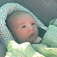 Zoe is registered to the contest to win money with this photo: baby, bed, blanket, bonnet, clothing, crib, cushion, face, furniture, hat, head, homedecor, infantbed, linen, newborn, person, photography, portrait, quilt, sleeping