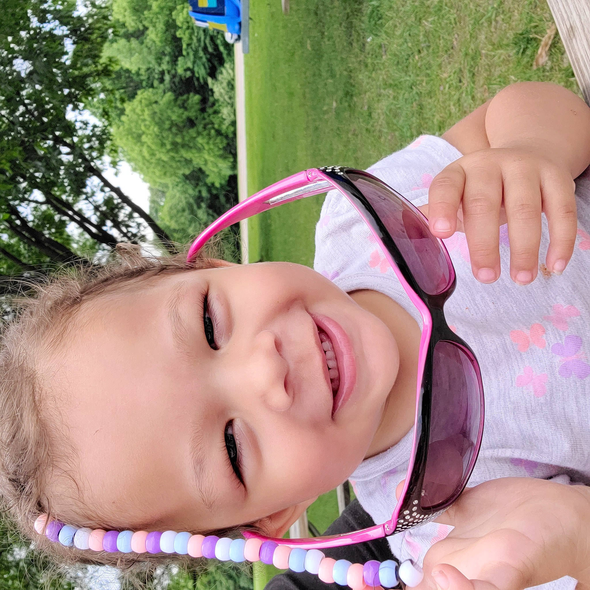 Zaria joined the competition — help win amazing prizes! baby, eye, eyelash, finger, fun, gesture, grass, hand, happy, joy, leisure, lip, mouth, nose, person, pink, plant, skin, smile, summer