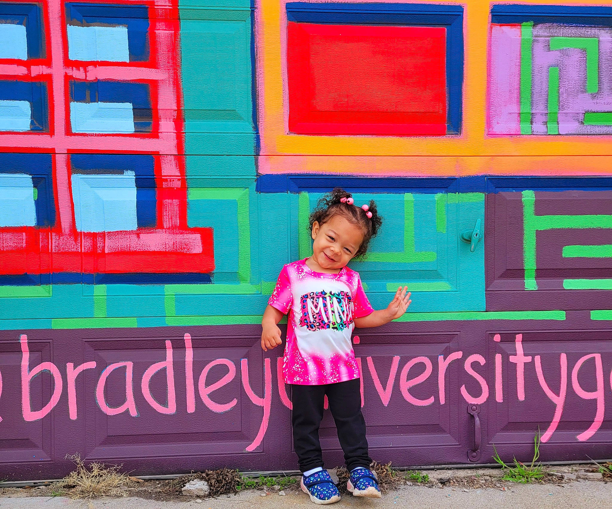 Zaria is registered to the contest to win money with this photo: azure, blue, happy, hat, human, joy, leisure, line, magenta, person, photograph, pink, public_space, rectangle, red, standing, t_shirt, textile, travel, wall