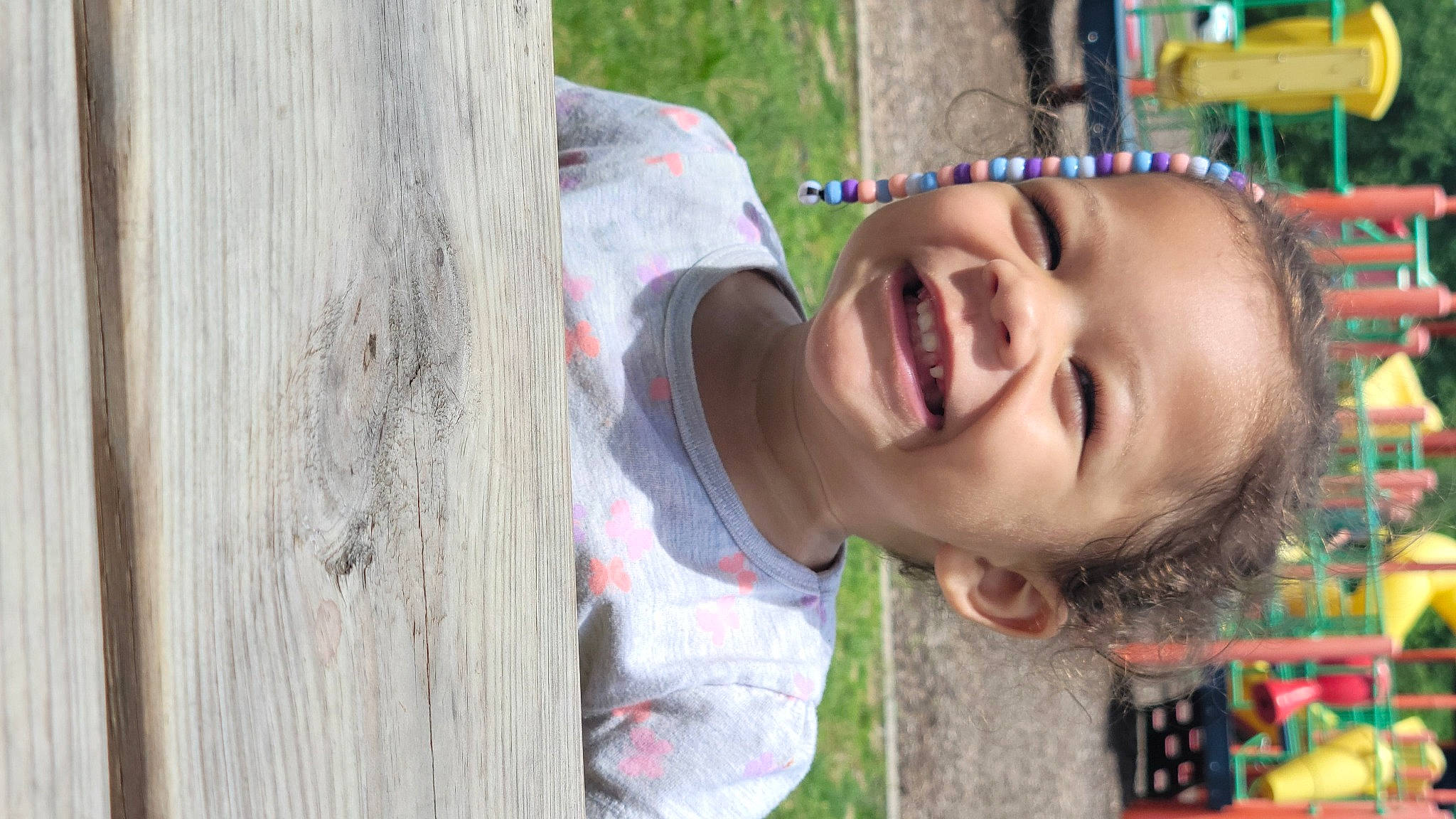 Zaria is registered to the contest to win money with this photo: cheek, child, fun, grass, happy, iris, joy, leisure, lip, mouth, nose, people_in_nature, person, plant, play, recreation, skin, smile, toddler, tree