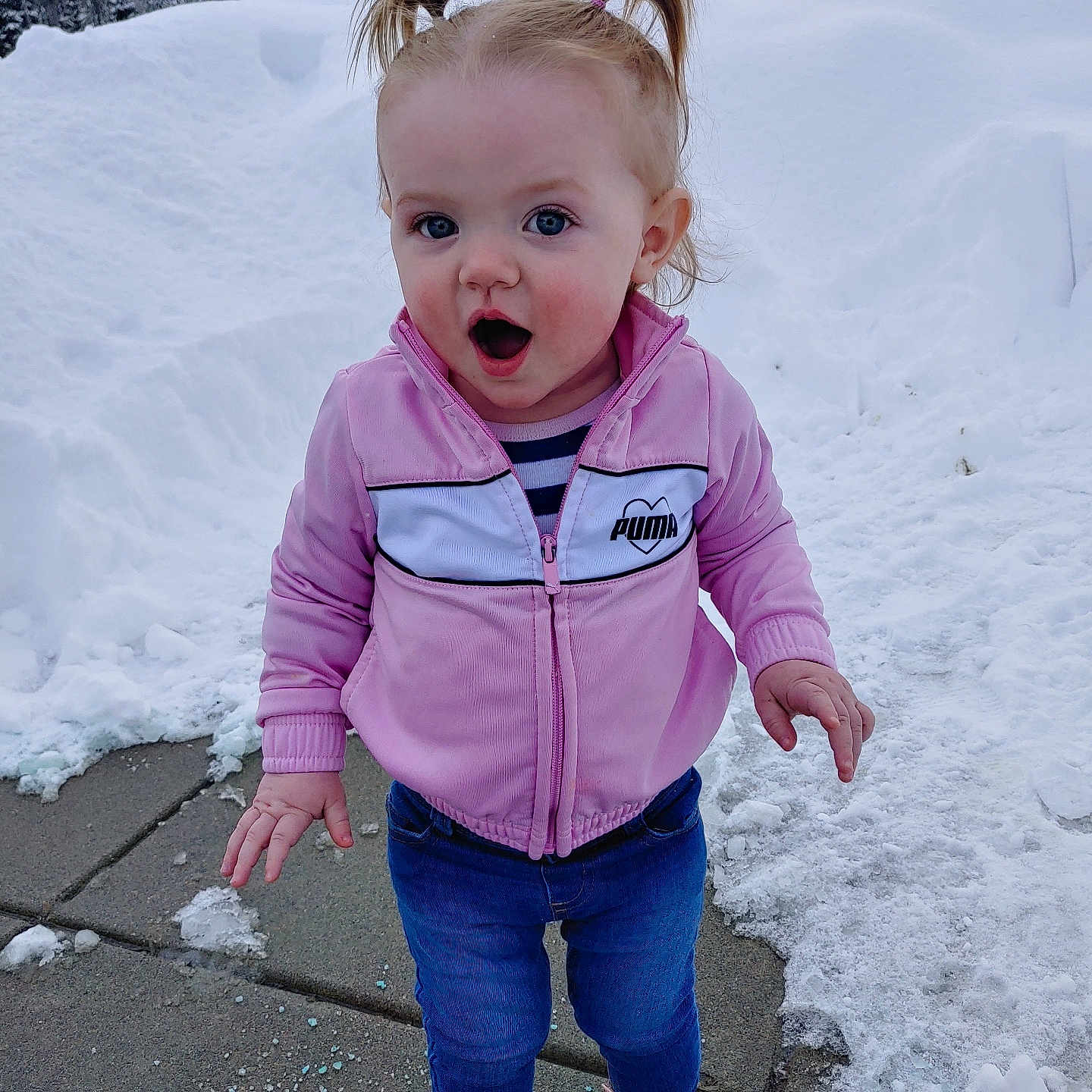 Addisyn joined the competition — help win amazing prizes! baby, bodypart, clothing, coat, face, finger, footwear, hand, head, ice, jacket, jeans, knitwear, outdoors, pants, person, photography, portrait, shoe, sweater