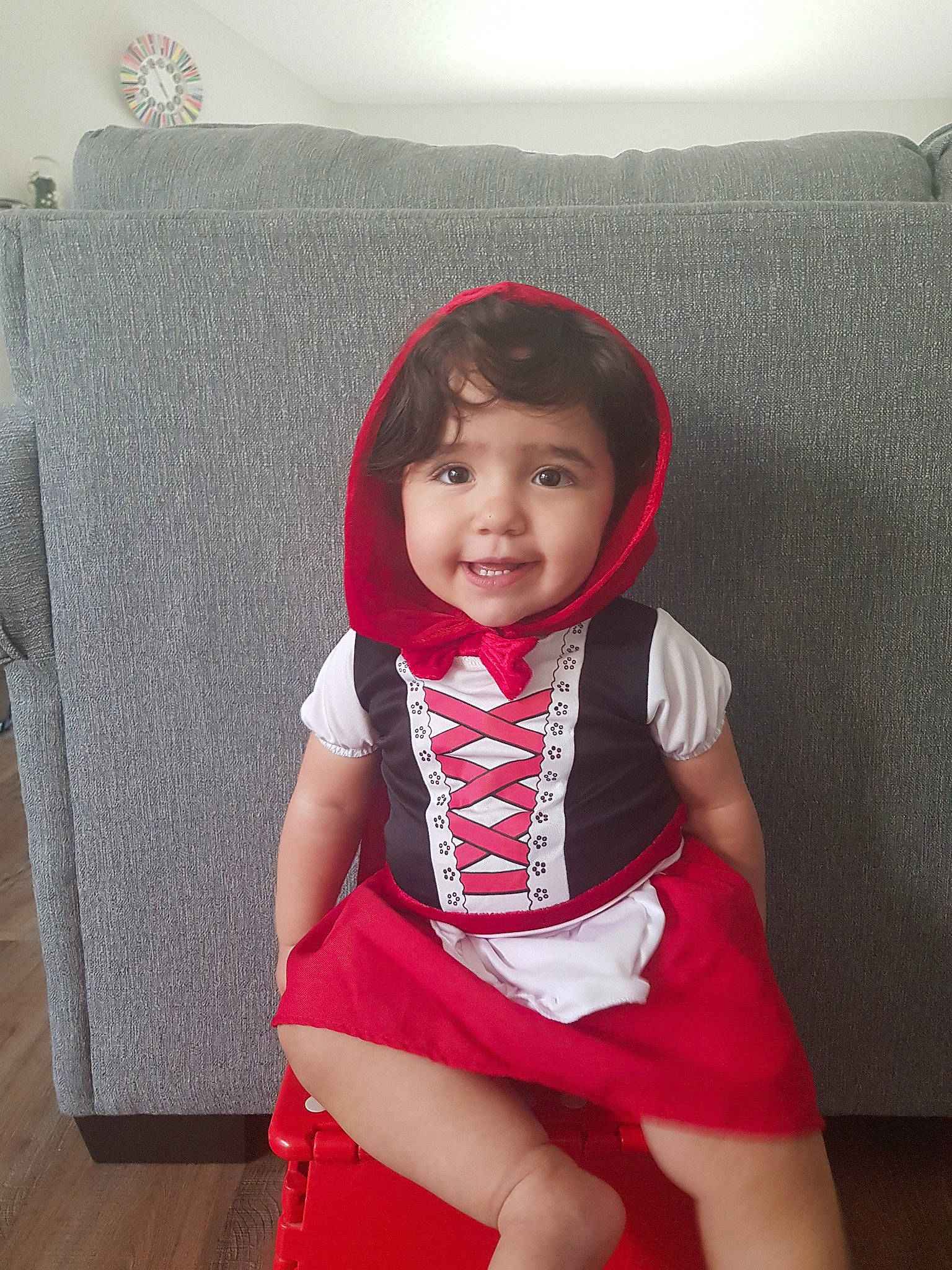 Tamara is registered to the contest to win money with this photo: baby, chair, child, joy, leg, person, red, sitting, skin, toddler