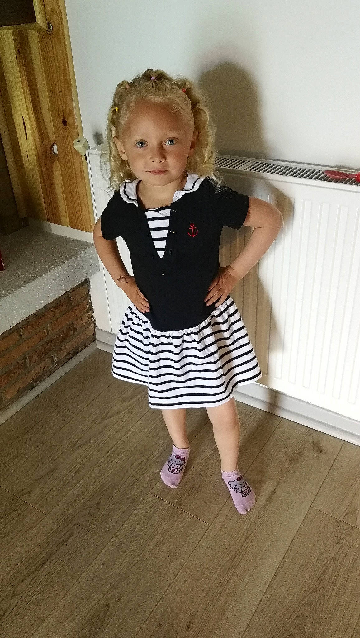 Kinsley participe au concours pour gagner de l'argent avec cette photo : child, clothing, day, dress, floor, flooring, footwear, girl, hair, human_hair_color, joint, leg, person, product, shoulder, sitting, skin, standing, textile, toddler