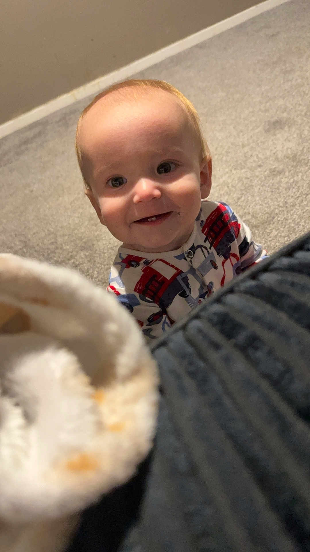 Huntley-Jaxson joined the competition — help win amazing prizes! baby, blanket, carpet, child, clothing, cozy, cute, face, floor, happy, head, home, indoor, infant, pajamas, person, playful, small, smile, young