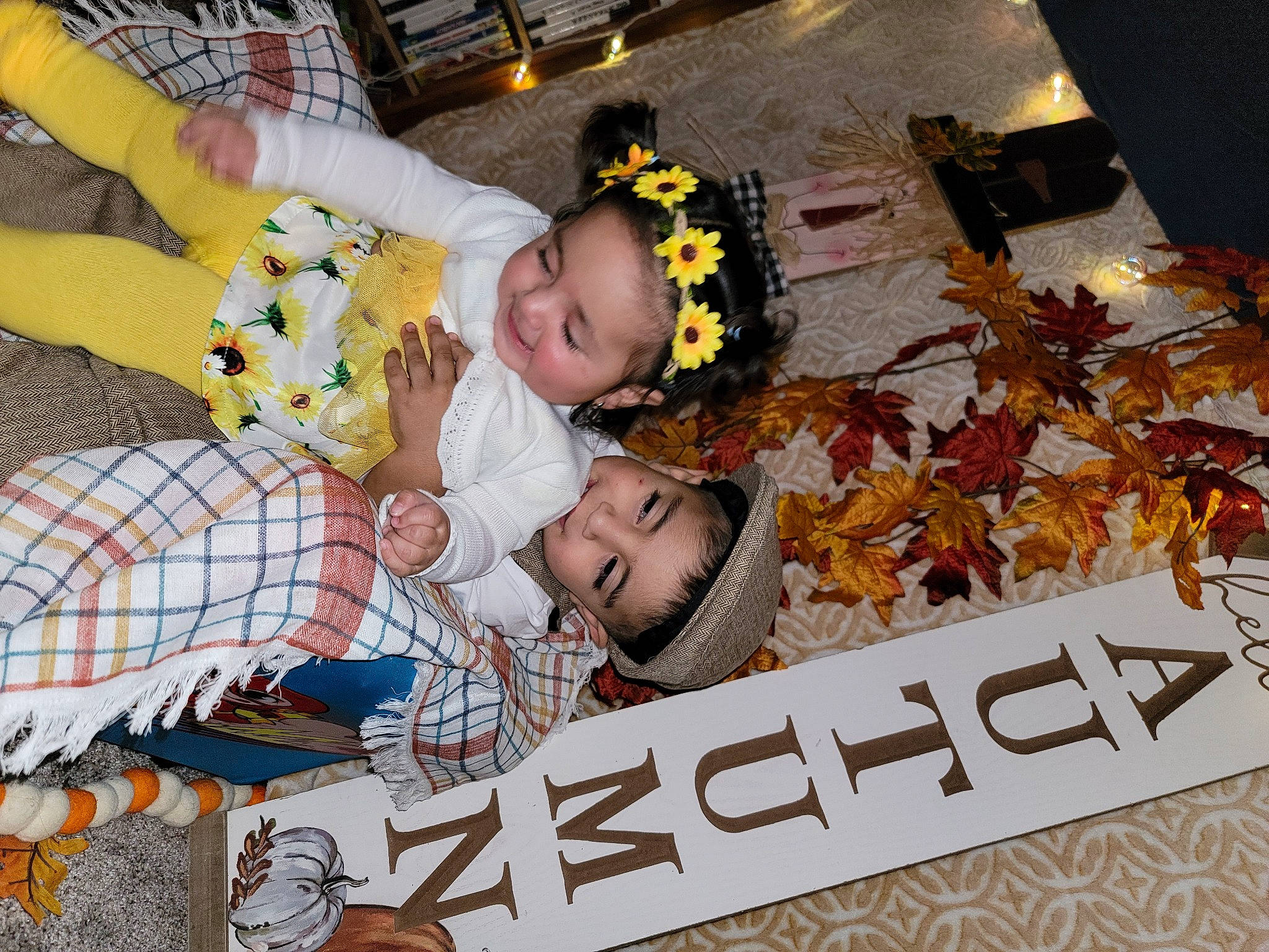 Azianna is registered to the contest to win money with this photo: baby, child, comfort, event, flower, font, fun, happy, joy, pattern, people, person, room, t_shirt, textile, toddler, tradition