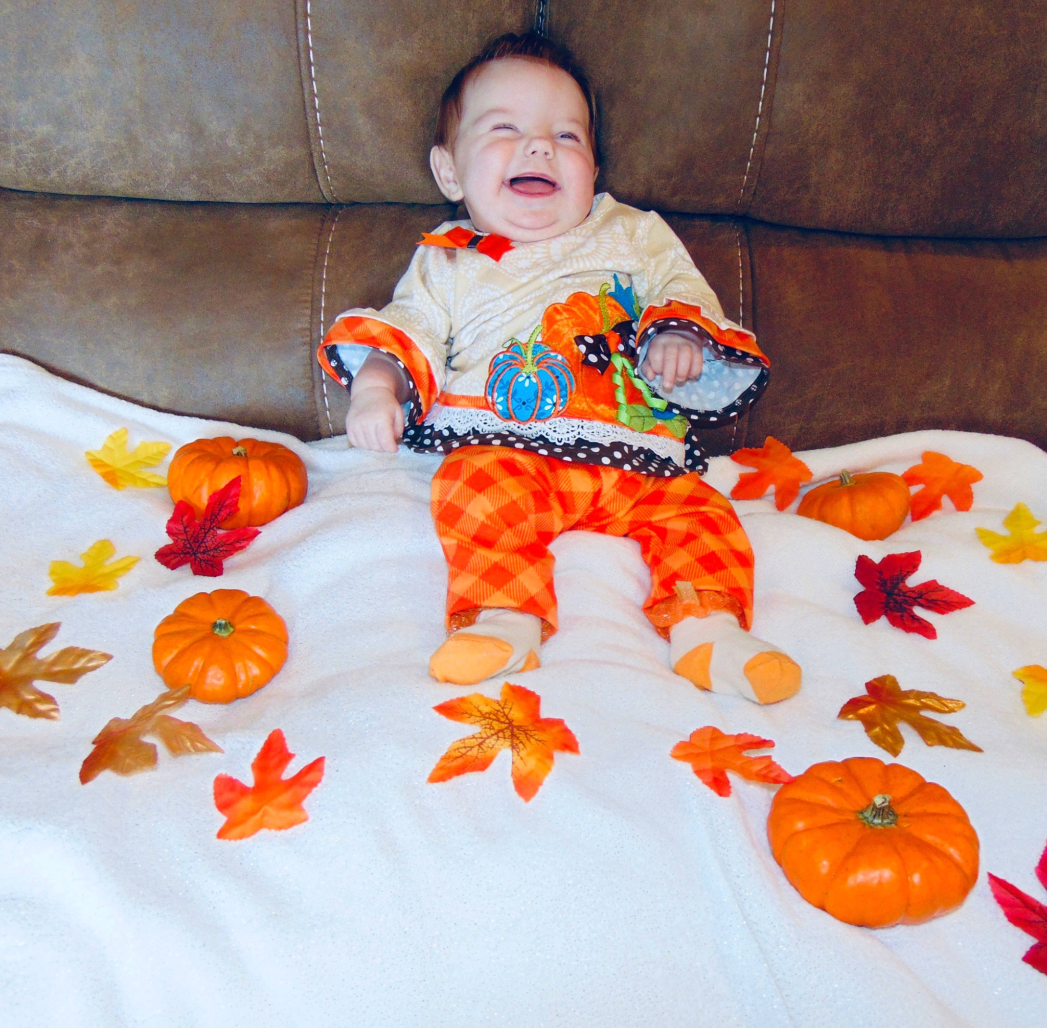 Paisleigh Lynn joined the competition — help win amazing prizes! baby, baby_toys, calabaza, child, costume, cucurbita, fruit, orange, person, plant, pumpkin, textile, toddler, trick_or_treat, vegetable, vegetarian_food, winter_squash