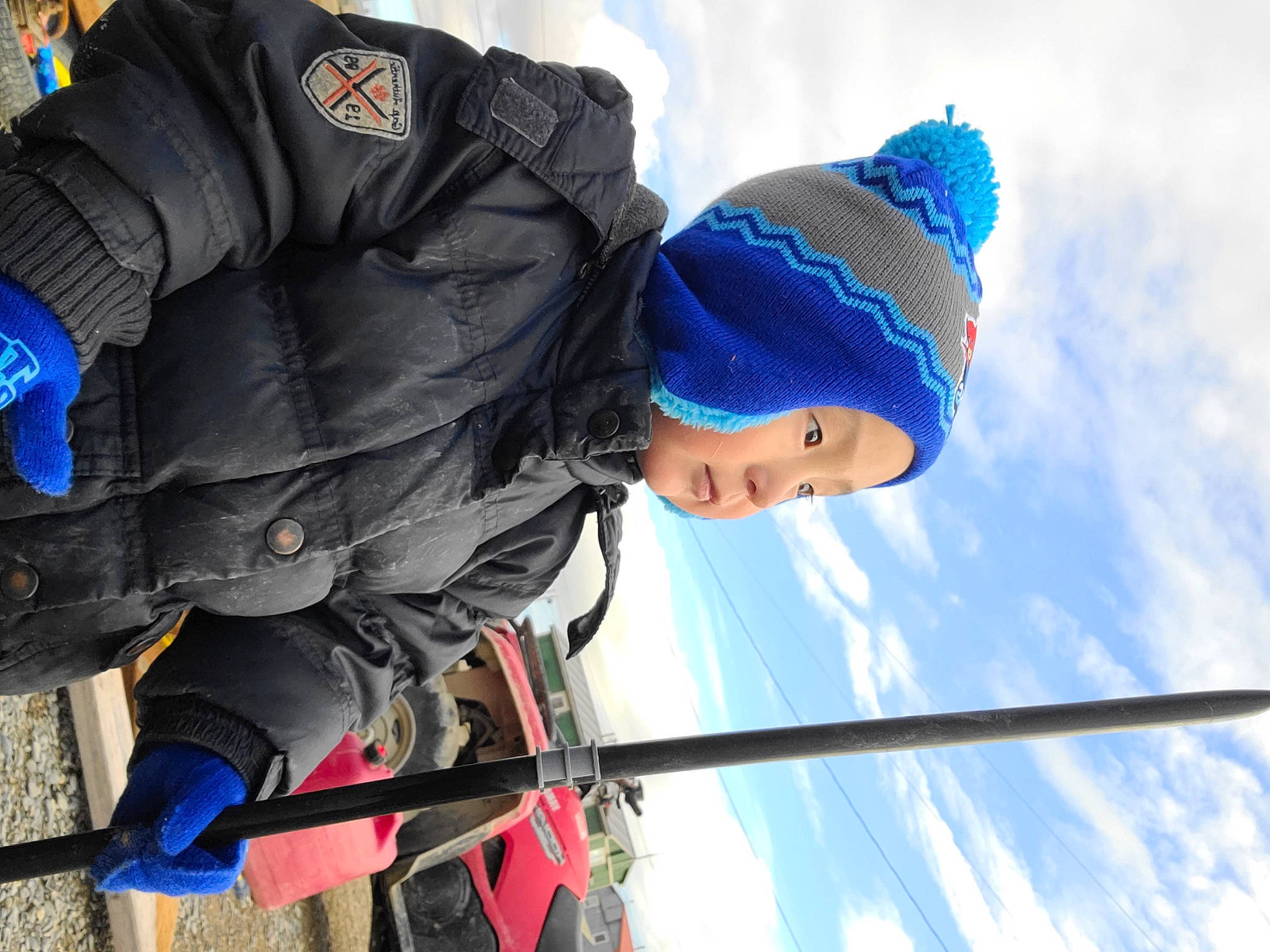 Clarence joined the competition — help win amazing prizes! blue, cap, cloud, electric_blue, freezing, fun, glove, headgear, jacket, leisure, outerwear, person, personal_protective_equipment, recreation, sky, snow, toddler, tree, vehicle, windbreaker