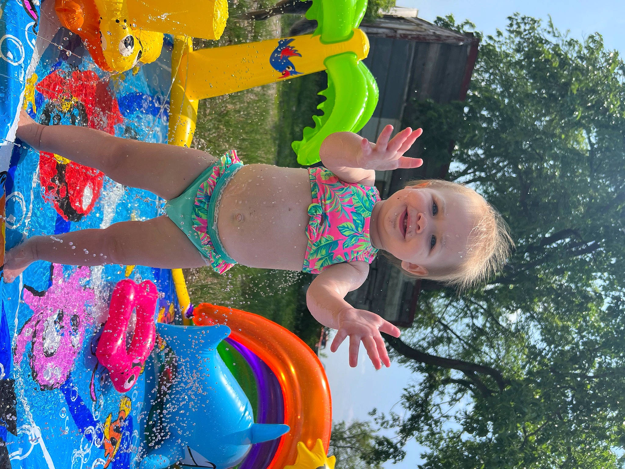 Aspen is registered to the contest to win money with this photo: child, electric_blue, event, fun, grass, green, happy, joy, leisure, party_supply, people_in_nature, person, play, recreation, sky, smile, summer, toddler, toy, tree
