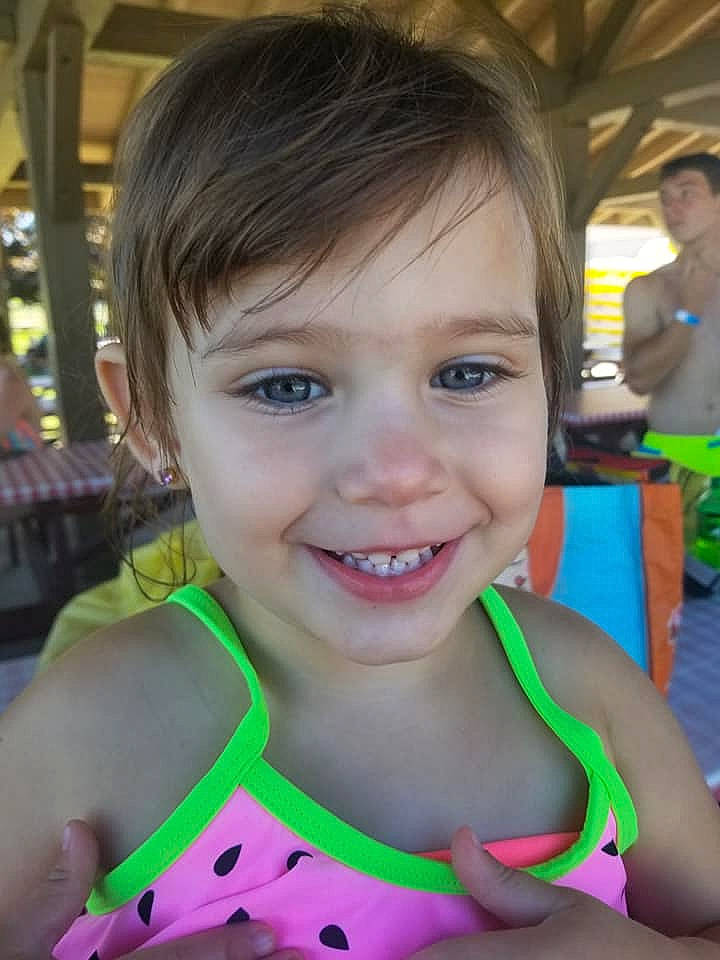 Geneva is registered to the contest to win money with this photo: brown_hair, child, child_model, ear, eye, face, facial_expression, fun, hair, hairstyle, happy, head, joy, neck, organ, person, skin, smile, summer, toddler