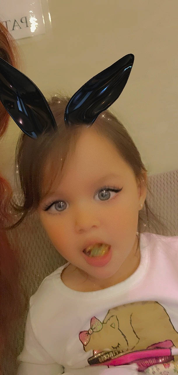 Ashley joined the competition — help win amazing prizes! bangs, chin, costume_hat, ear, eyebrow, eyelash, forehead, hair, hairstyle, headpiece, helmet, iris, jaw, lip, long_hair, makeover, neck, nose, person, skin