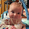 Emery joined the competition — help win amazing prizes! baby, infant, child, play_mat, toy, indoor, wooden_furniture, curious, clothing, smile, face, hands, floor, colorful, playtime, head, eyes, person, crawling, home