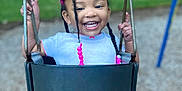 Khada is registered to the contest to win money with this photo: bodypart, child, face, female, girl, grass, happy, head, nature, outdoorplayarea, outdoors, park, person, photography, plant, playarea, portrait, smile, toy, tree