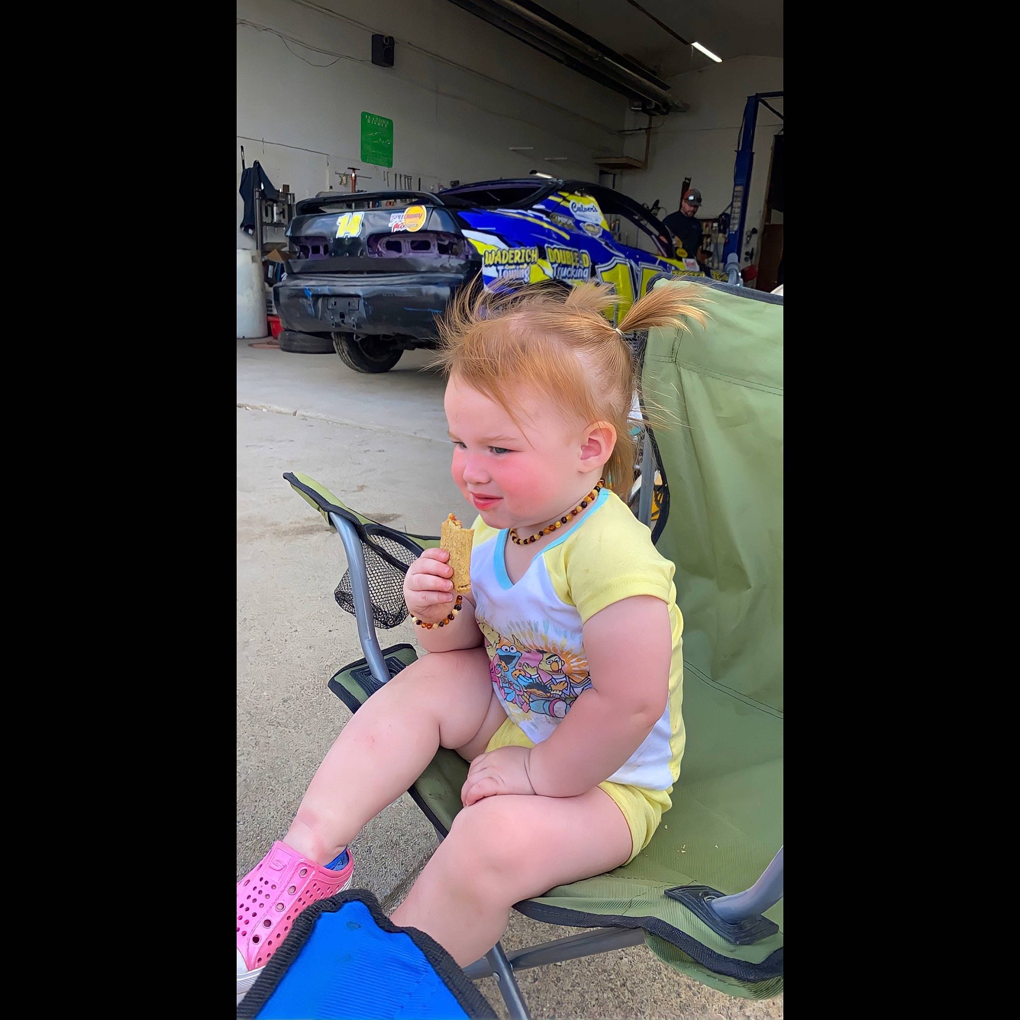 Paislee is registered to the contest to win money with this photo: auto_part, automotive_exterior, baby, baby_carriage, baby_products, car_seat, child, electric_blue, fun, human_leg, knee, lap, motor_vehicle, person, personal_luxury_car, pink, recreation, t_shirt, thigh, toddler