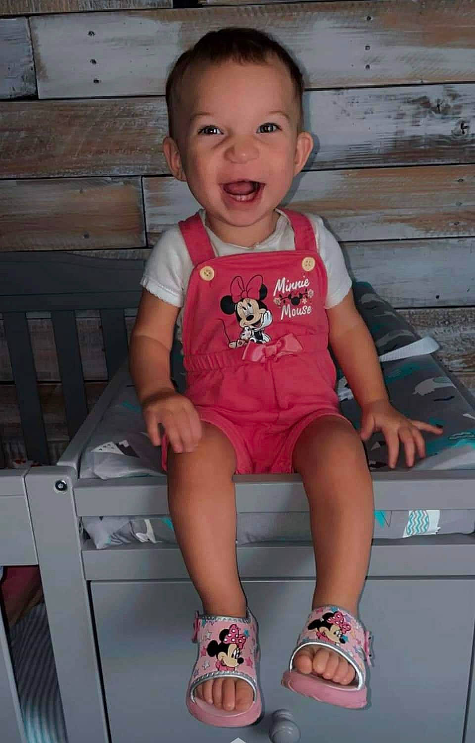 Savannah joined the competition — help win amazing prizes! baby_toddler_clothing, cabinetry, child, facial_expression, finger, happy, joint, knee, lap, leg, organ, person, pink, sandal, sleeve, smile, standing, t_shirt, thigh, toddler