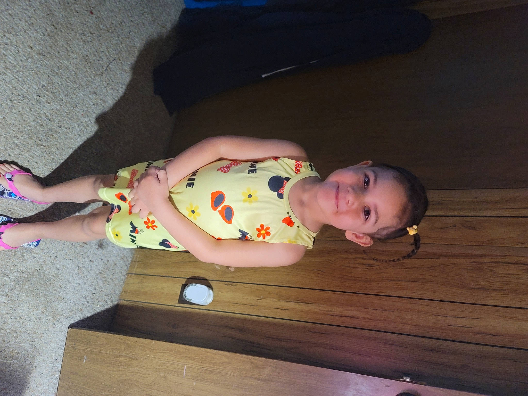 Brinlee is registered to the contest to win money with this photo: baby, baby_products, baby_toddler_clothing, cheek, child, comfort, dress, finger, flooring, foot, fun, hardwood, joy, knee, leg, person, skin, sleeve, thigh, toddler