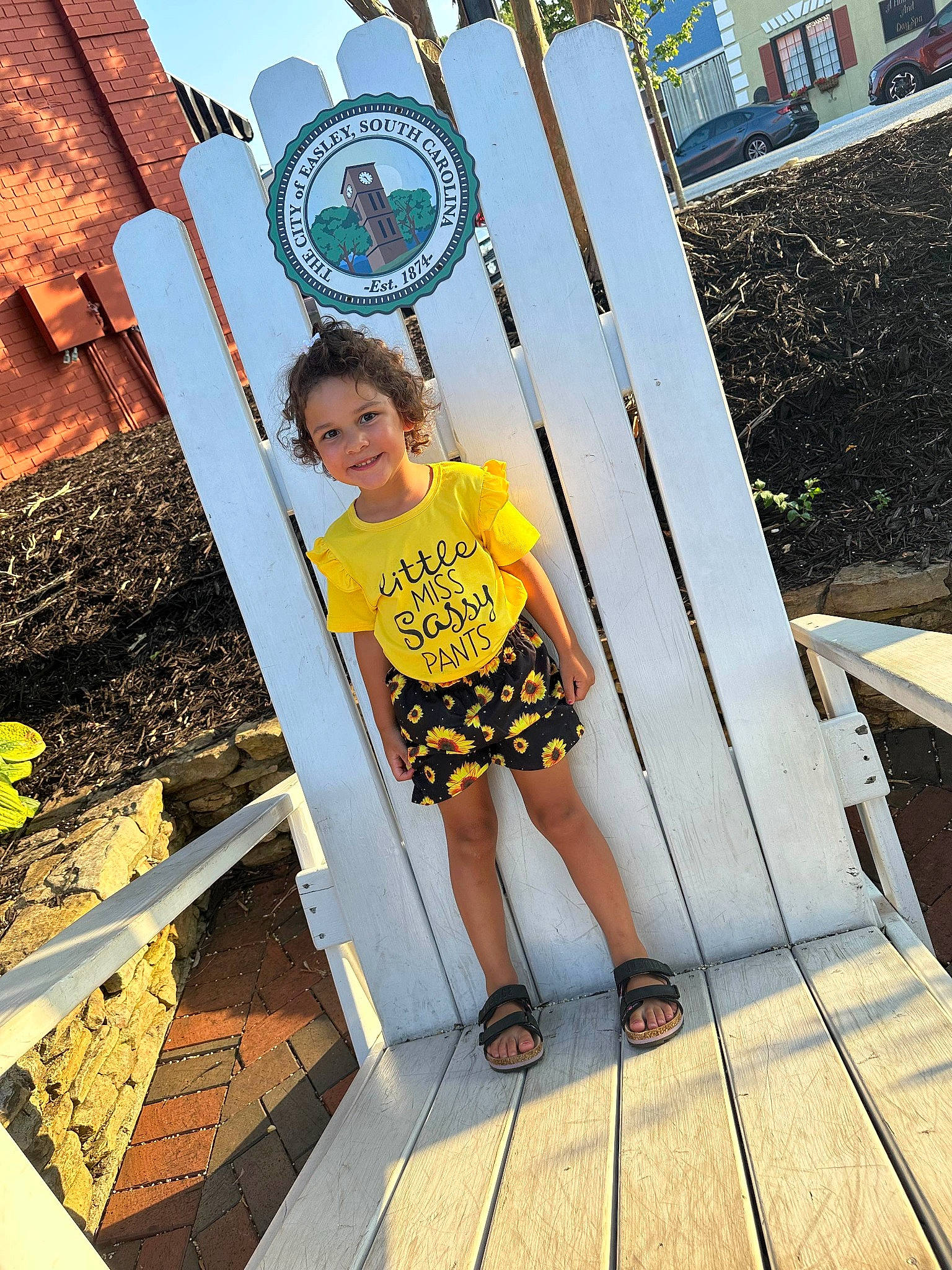 Brinlee joined the competition — help win amazing prizes! brick, child, city, eyewear, fun, grass, happy, human_leg, joy, leisure, person, plant, recreation, sandal, shorts, t_shirt, thigh, toddler, tourism, travel